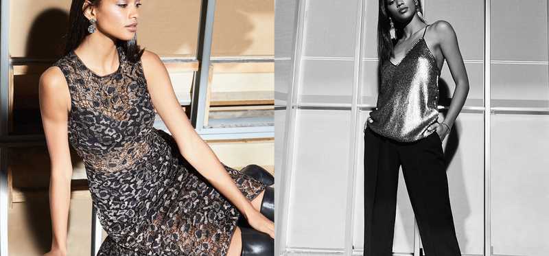 Two women modeling clothes in a studio background