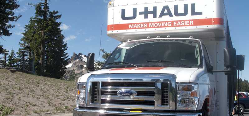 A U-Haul truck on the road.