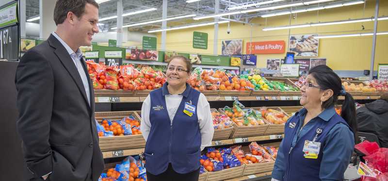 Walmart CEO meeting with associates.