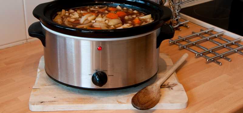 A crockpot full of food.