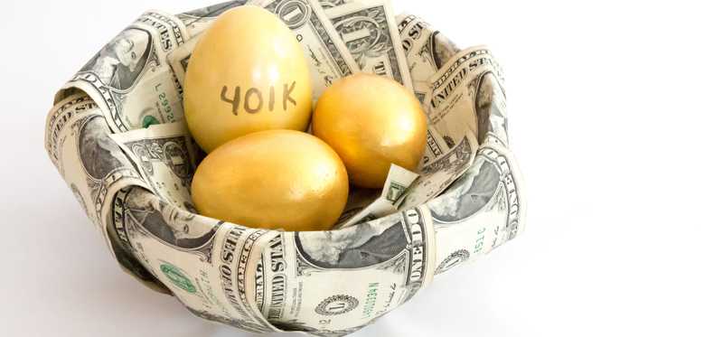 Basket lined with money holding golden eggs that read 401k.