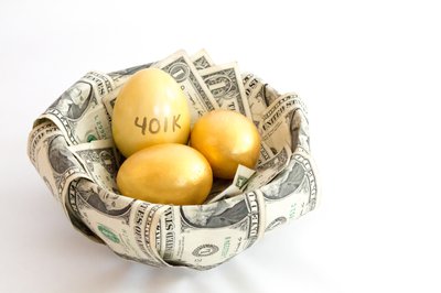 Basket lined with money holding golden eggs that read 401k.