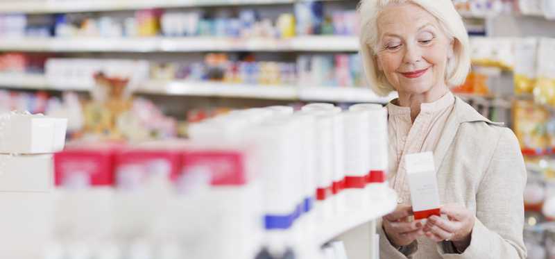 Person shopping in a drugstore.