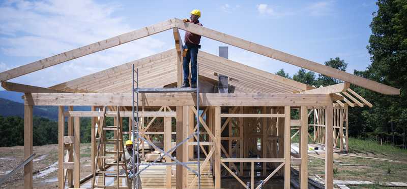 A home under construction with the framing done.