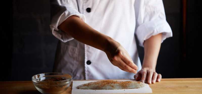Food being prepared by a chef.