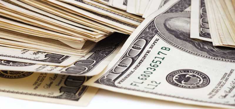 A pile of hundred dollar bills.