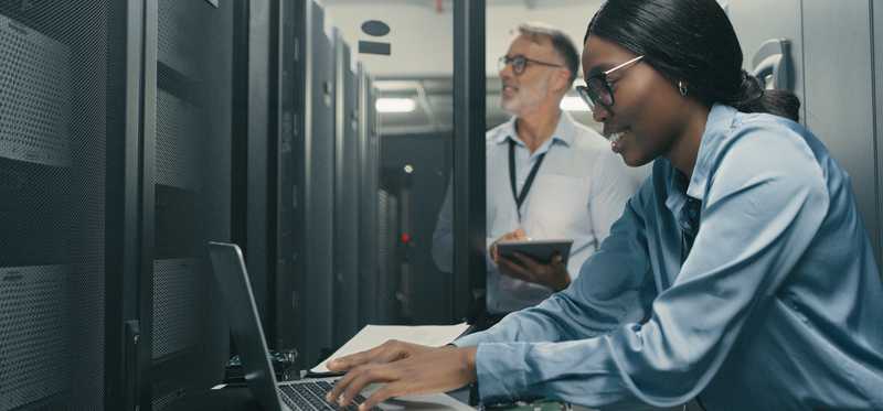 People working in a data center.
