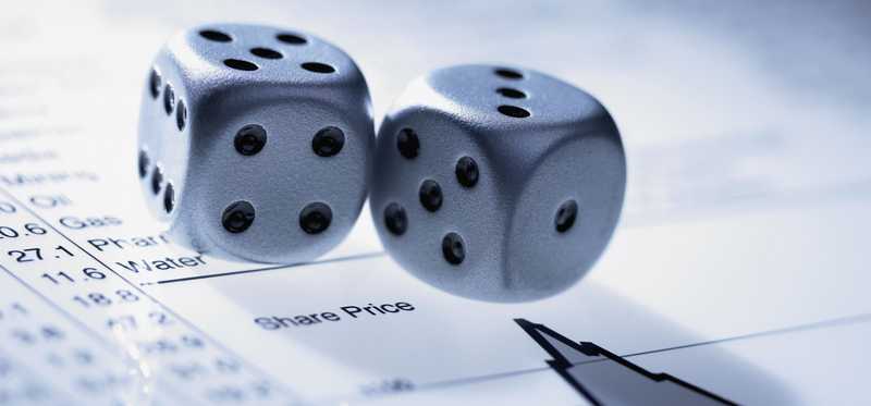 Pair of dice on financial document