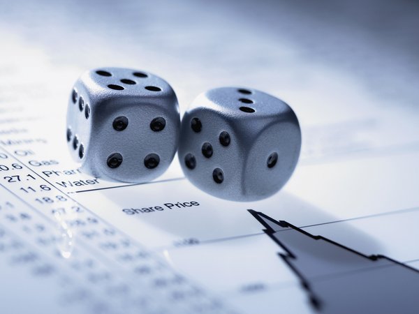 Pair of dice on financial document