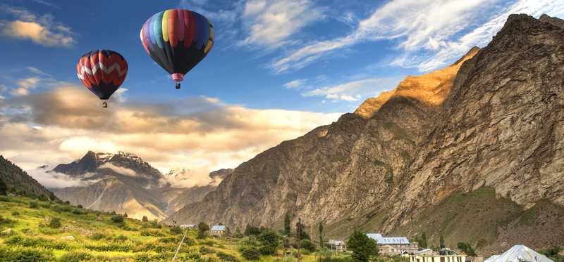 hot air balloons flying near mountains in New Mexico