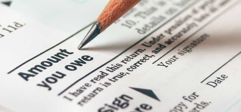 Bottom line of tax form showing amount owed.