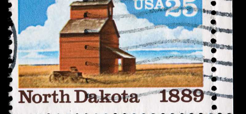 A U.S. stamp depicting North Dakota.