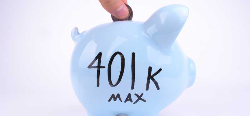 Blue piggy bank with 401k Max written on its side.