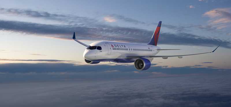 A Delta Air Lines plane flying in the sky