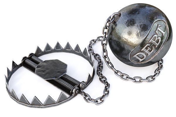 A bear trap with an attached weighted ball that has the word Debt engraved on it.