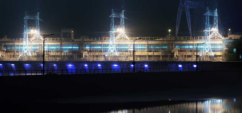 A hydroelectric facility at night.