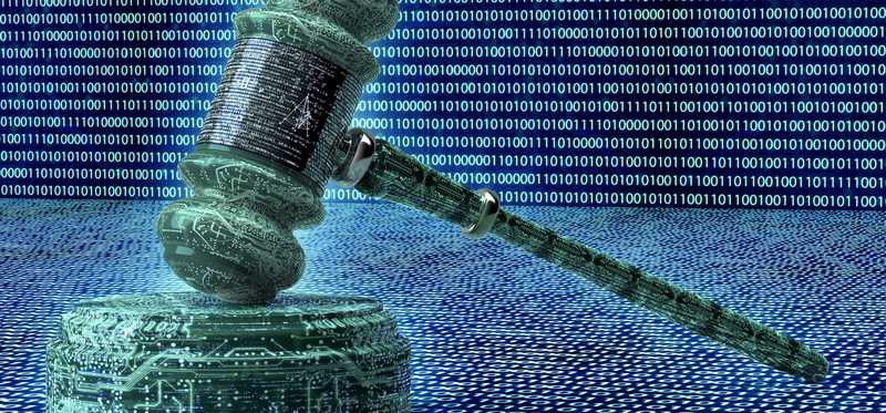 A judge's gavel surrounded by binary code.