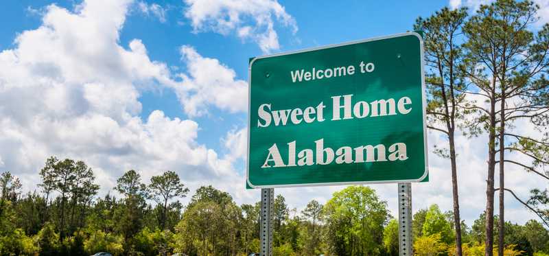 Alabama roadside welcome sign that says Welcome to Sweet Home Alabama.