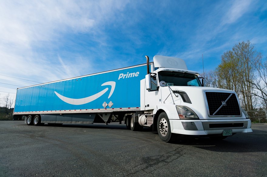 An Amazon Prime truck in a parking lot.