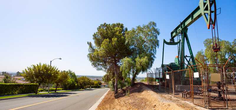 An oil pump by a road in California.