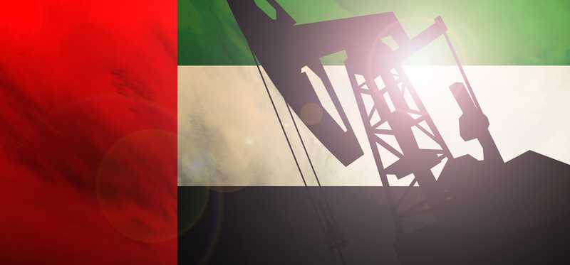 An oil pump with the UAE flag as a background.