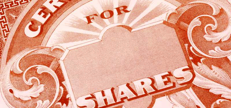 An up-close view of a paper stock certificate.