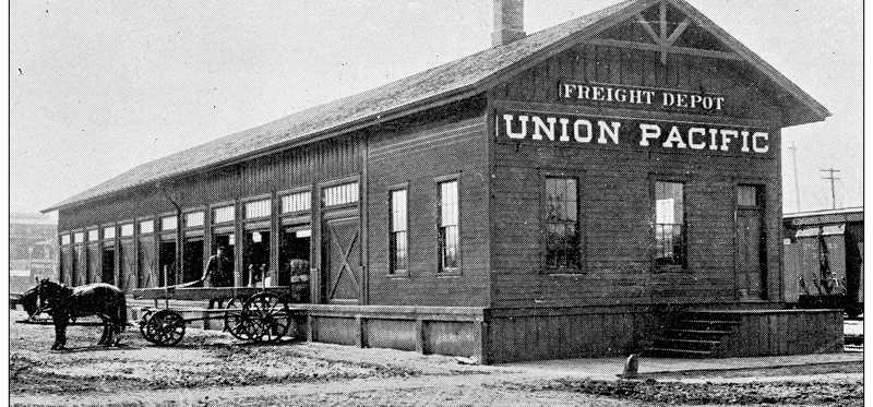 A Union Pacific freight depot with a horse and carriage.