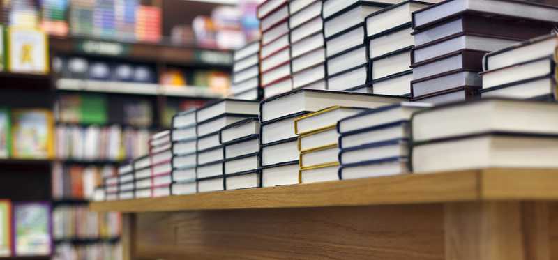 Books stacked on a table.