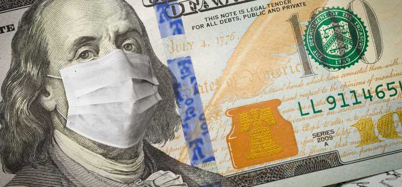 Hundred dollar bill with image of Ben Franklin wearing mask