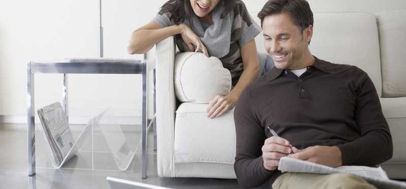 Couple using laptop computer.
