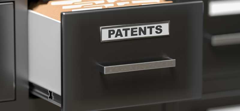 Drawer in a filing cabinet labeled patents.