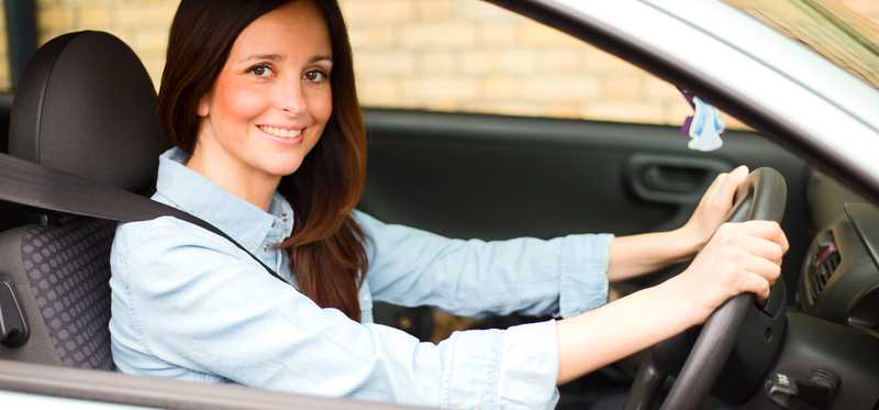 Person driving a car.