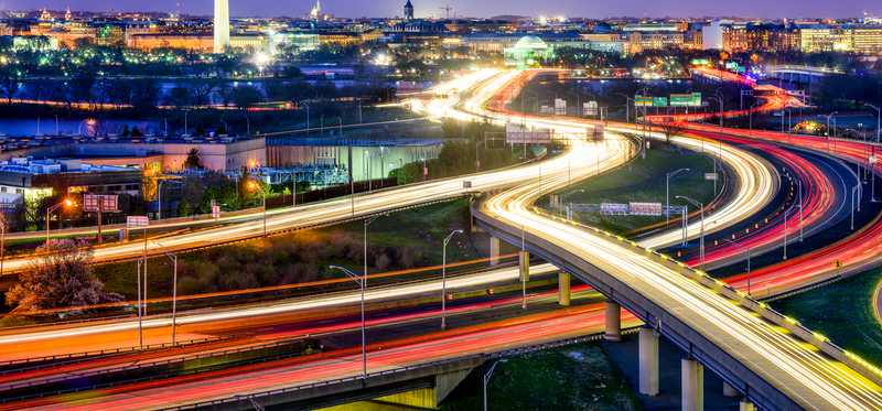 An evening shot of freeway traffic heading into Washington, D.C.
