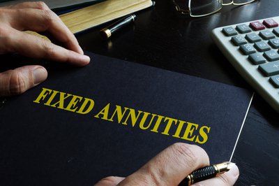 A fixed annuities book sits on a table.