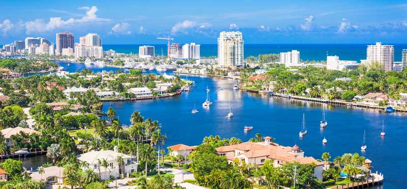 A long view of Fort Lauderdale, Florida, with canals and ocean.