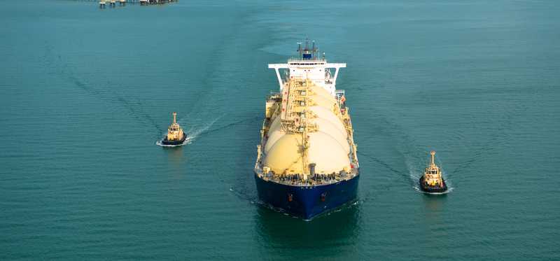 Fully Loaded Liquid Natural Gas Tanker underway Departing Harbour.