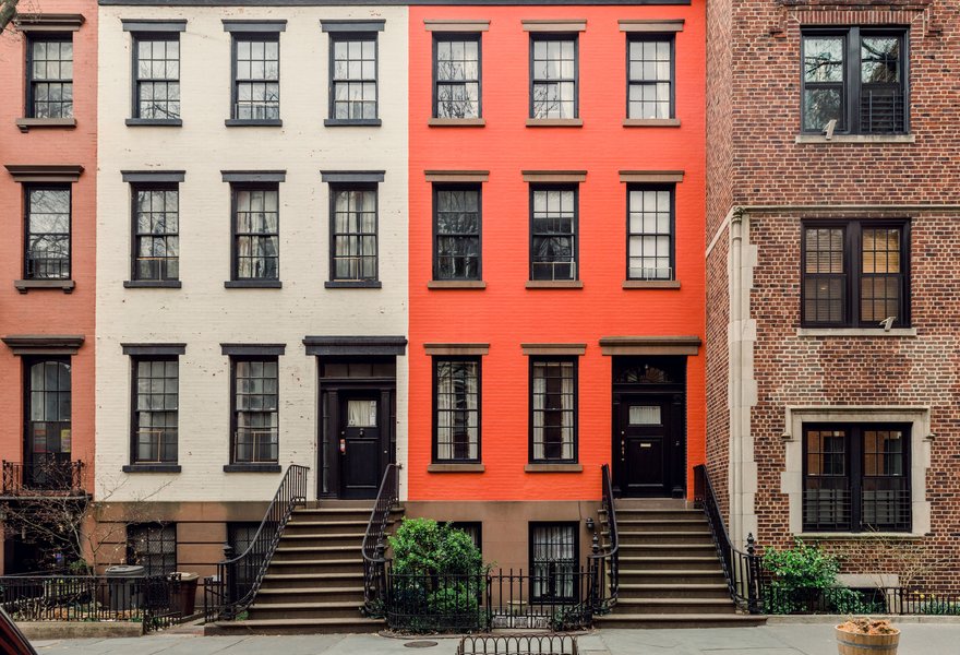 Brownstone facades and row houses in an iconic neighborhood of Brooklyn Heights in New York City.