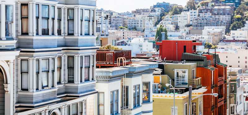 San Francisco skyline and real estate overlooking city.