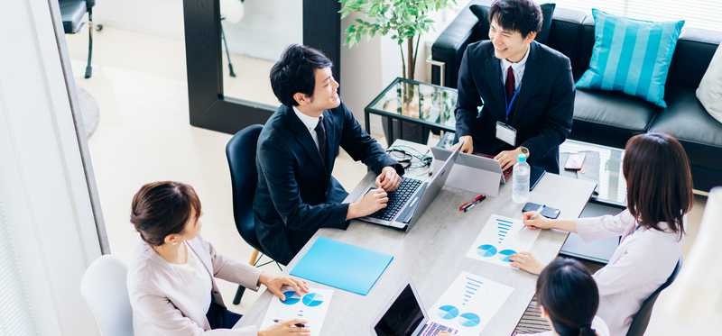 Businesspersons working in an office.