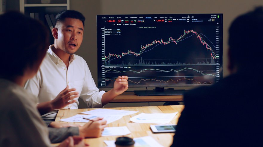 Man leading business meeting