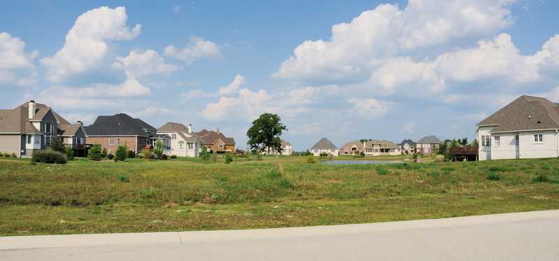 Vacant residential lot near growing neighborhood.