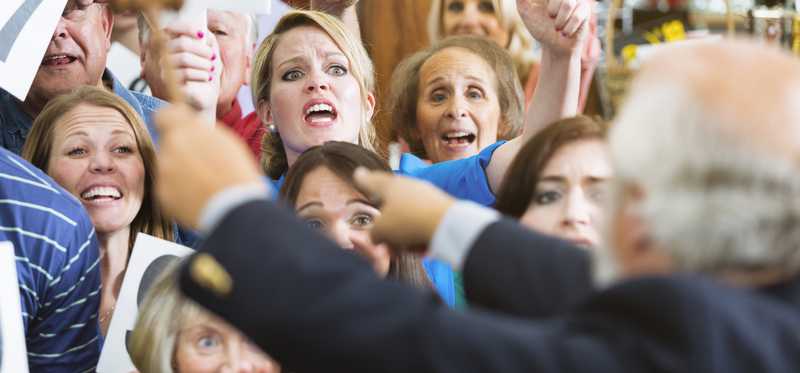 Frenzied buyers at an auction.