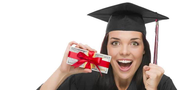 Happy graduate holding cash tied with ribbon.