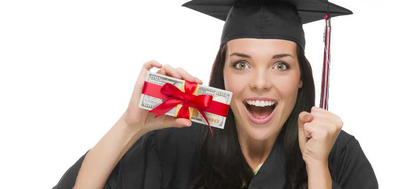 Female college grad in cap and gown holding a stack of cash wrapped in ribbon