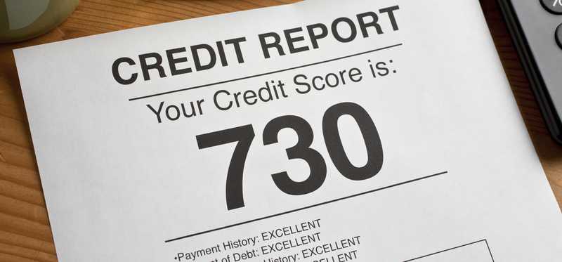 Paper that says Your Credit Score is: 730.
