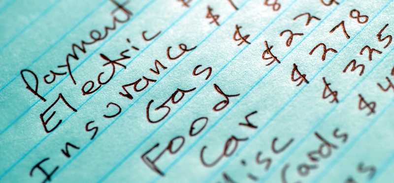 Handwritten budget page listing categories.
