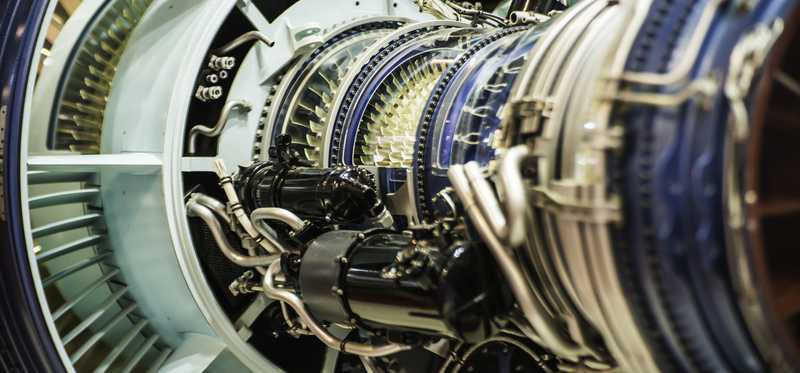 A close-up of part of an airplane engine.