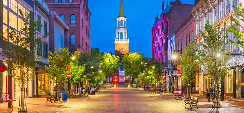 The city of Burlington, Vermont, is shown in the evening.