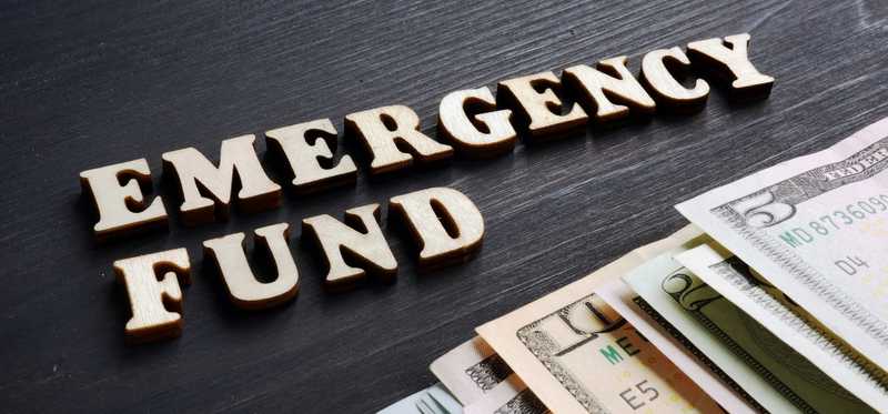 The words Emergency Fund next to money.
