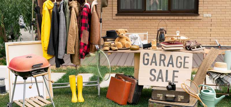 Items on a lawn at a garage sale.